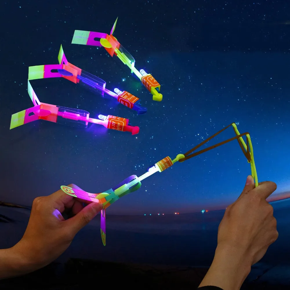 5Pcs Outdoor Shining Rocket Flash LED Elastic Helicopter Rotating Flying Toy Arrow Gift Children Fairy Catapult Luminous Toys