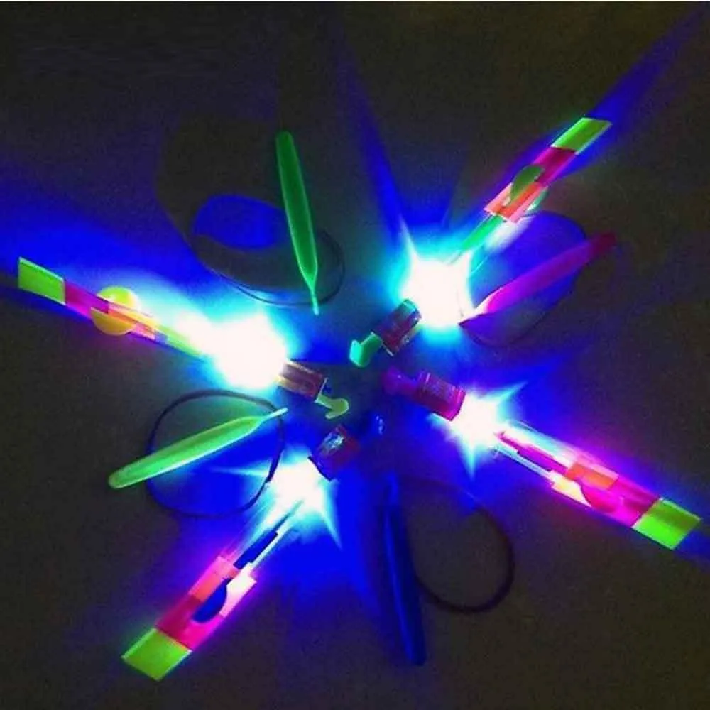 5Pcs Outdoor Shining Rocket Flash LED Elastic Helicopter Rotating Flying Toy Arrow Gift Children Fairy Catapult Luminous Toys