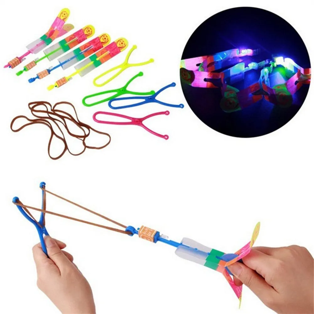 5Pcs Outdoor Shining Rocket Flash LED Elastic Helicopter Rotating Flying Toy Arrow Gift Children Fairy Catapult Luminous Toys