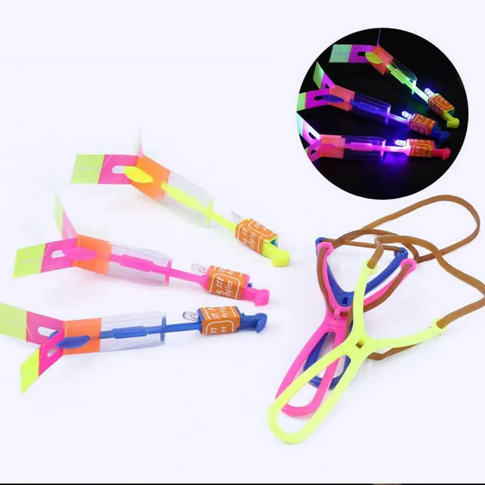 5Pcs Outdoor Shining Rocket Flash LED Elastic Helicopter Rotating Flying Toy Arrow Gift Children Fairy Catapult Luminous Toys